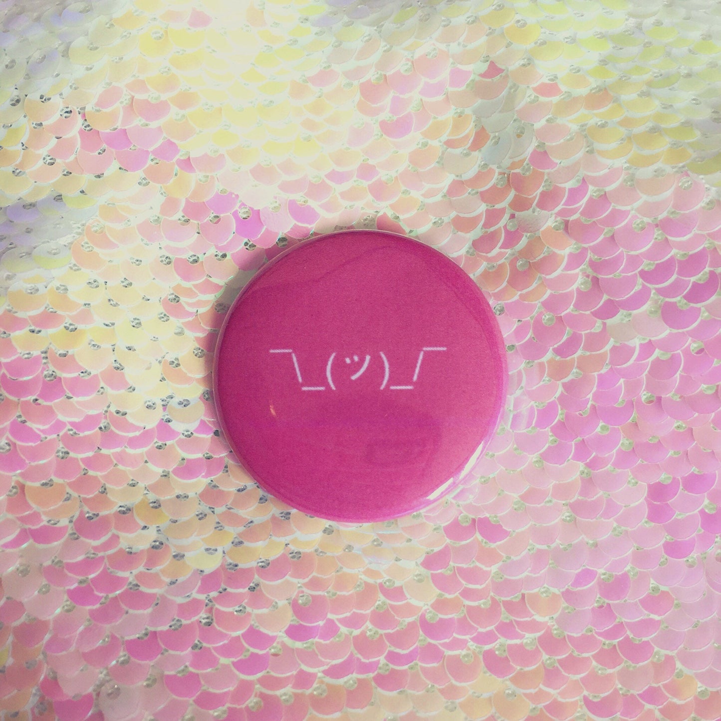 Shrug Emoticon Button