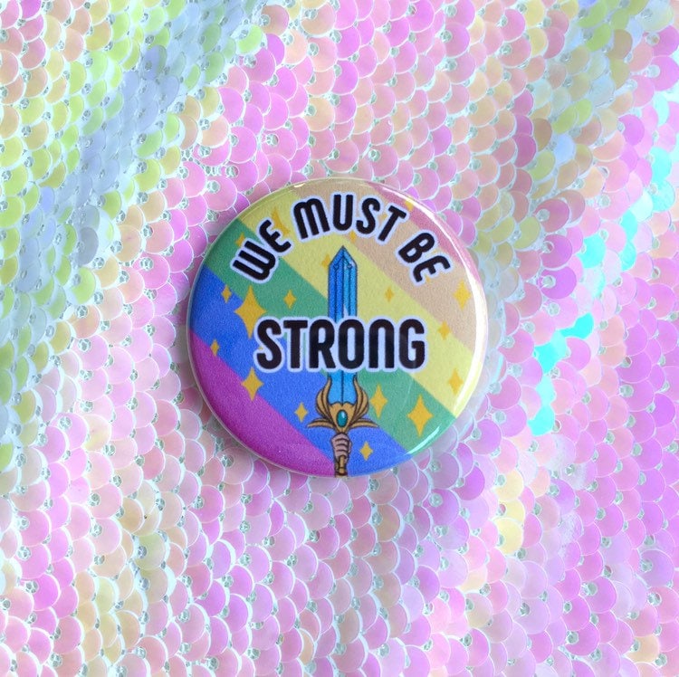 We Must Be Strong She-Ra Gay Pride Button